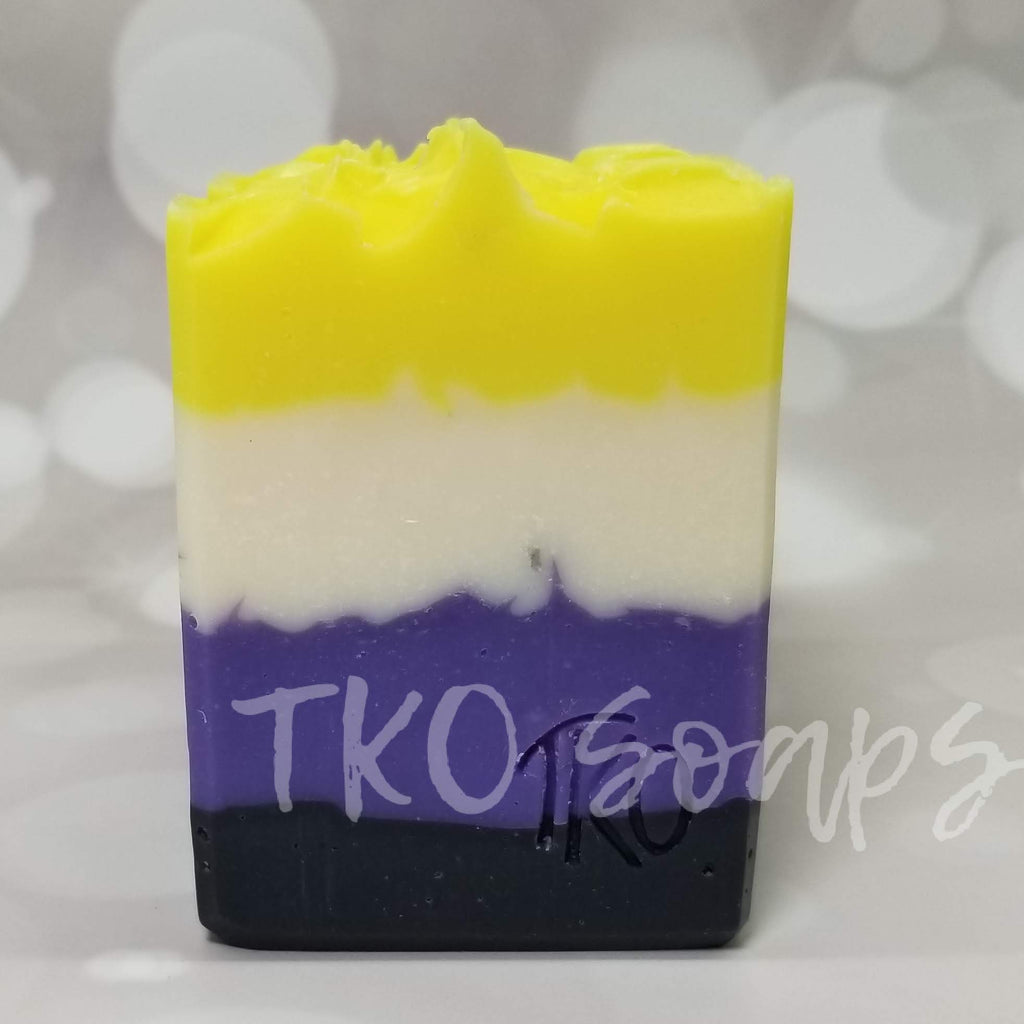 rectangular bar of soap striped in 4 colors to represent the nonbinary flag